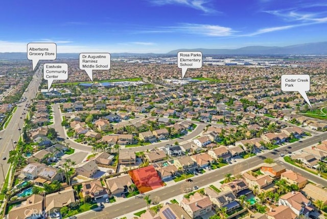 birds eye view of property featuring a residential view and a mountain view