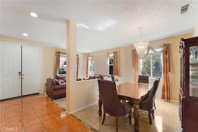 dining area with recessed lighting, baseboards, visible vents, a notable chandelier, and light tile patterned flooring