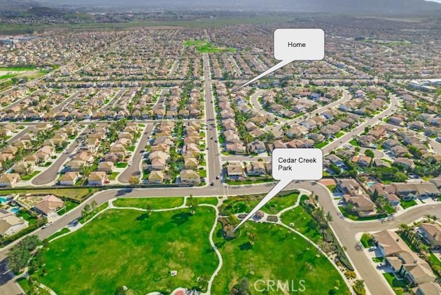 birds eye view of property with a residential view