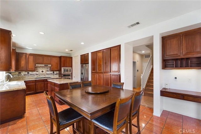 dining area featuring stairway, light tile patterned flooring, visible vents, and recessed lighting