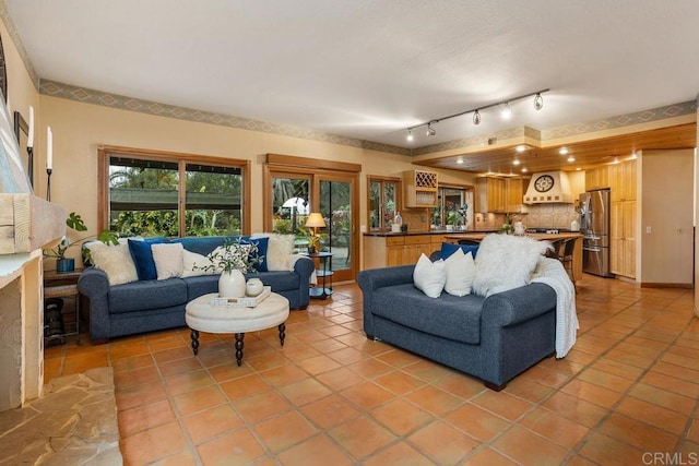 living area featuring light tile patterned flooring