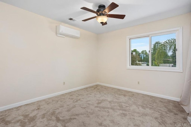 carpeted empty room featuring baseboards, visible vents, ceiling fan, and a wall mounted air conditioner