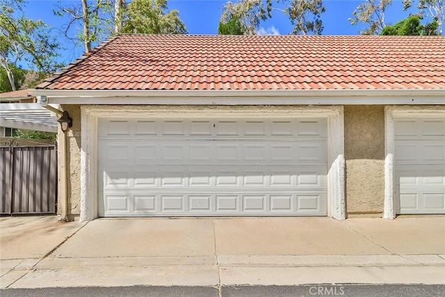 garage with fence