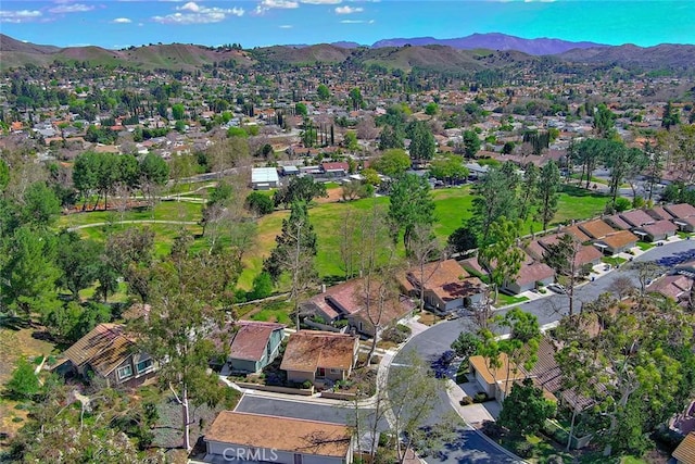 bird's eye view featuring a residential view and a mountain view