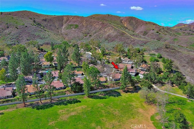 bird's eye view featuring a residential view and a mountain view