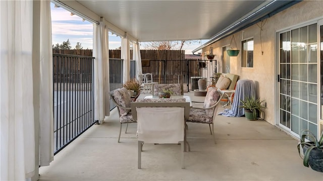 view of patio featuring fence