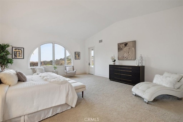 bedroom featuring lofted ceiling, carpet flooring, visible vents, and baseboards