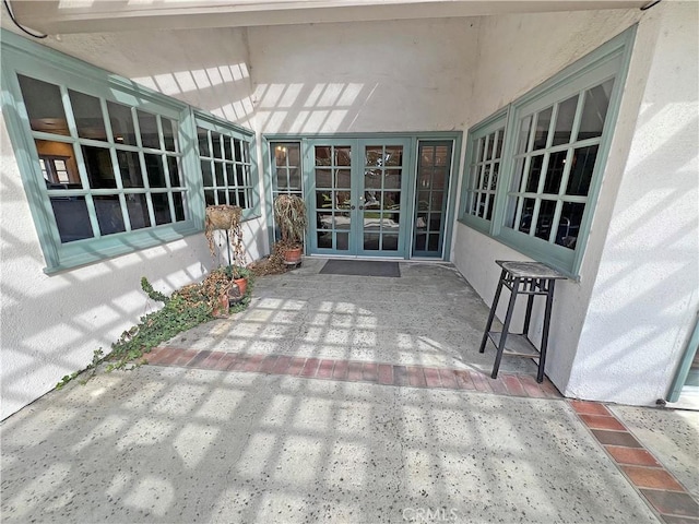 view of patio featuring french doors