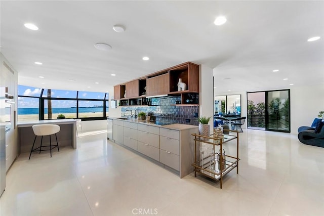 kitchen with backsplash, open shelves, black electric stovetop, modern cabinets, and recessed lighting
