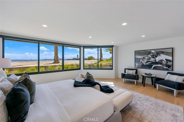 bedroom featuring light wood-style flooring and recessed lighting