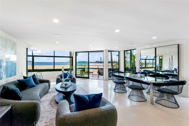 living room with expansive windows and recessed lighting