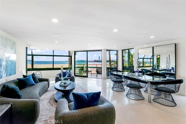 1310 E Ocean Blvd Unit 14, Long Beach, CA 90802 - living room with recessed lighting, a wall of windows, and a water view