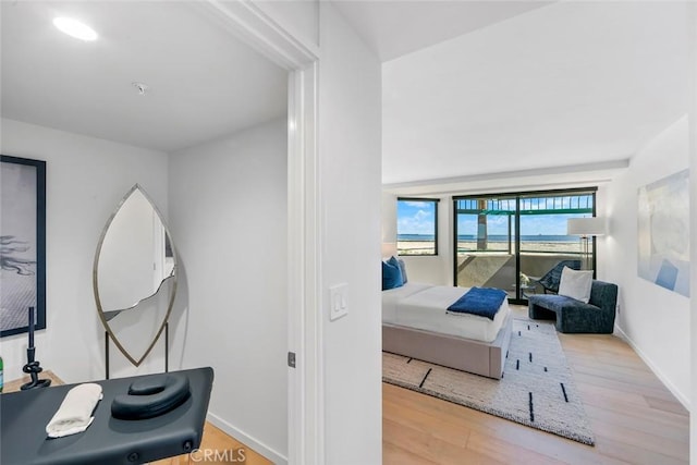 1310 E Ocean Blvd Unit 14, Long Beach, CA 90802 - bedroom with wood finished floors