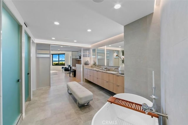 1310 E Ocean Blvd Unit 14, Long Beach, CA 90802 - bathroom with a freestanding bath, vanity, and recessed lighting