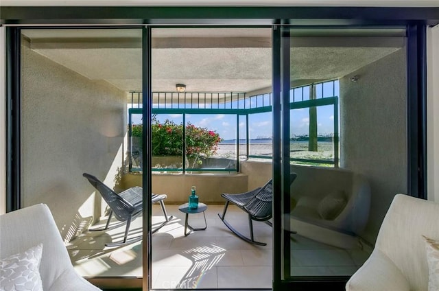 1310 E Ocean Blvd Unit 14, Long Beach, CA 90802 - sunroom featuring a water view