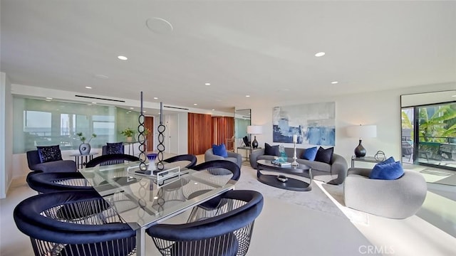 dining space with recessed lighting