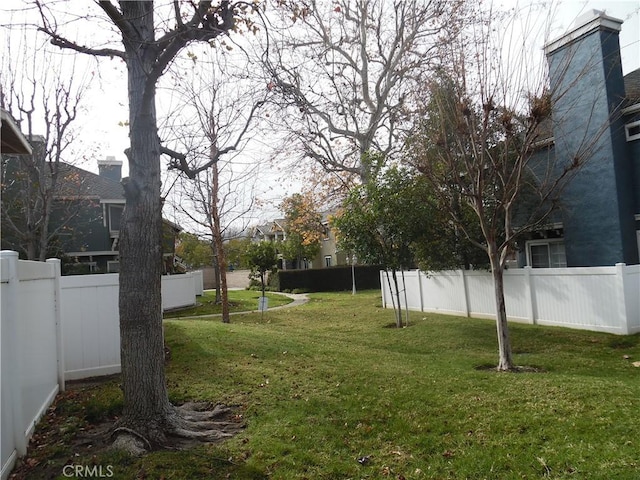 view of yard featuring fence