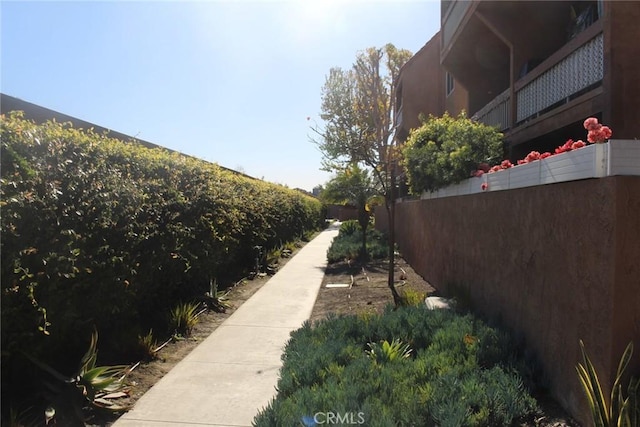 view of home's community featuring a fenced backyard