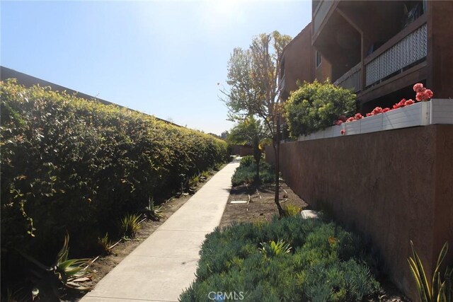 6600 Warner Ave Unit 142, Huntington Beach, CA 92647 - view of property exterior featuring fence
