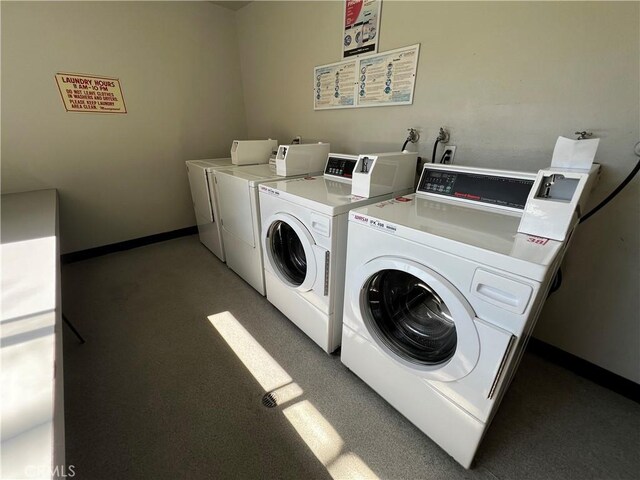 6600 Warner Ave Unit 142, Huntington Beach, CA 92647 - shared laundry featuring separate washer and dryer, baseboards, and light carpet