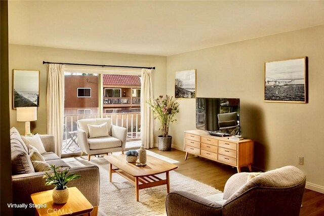 6600 Warner Ave Unit 142, Huntington Beach, CA 92647 - living room with wood finished floors and baseboards