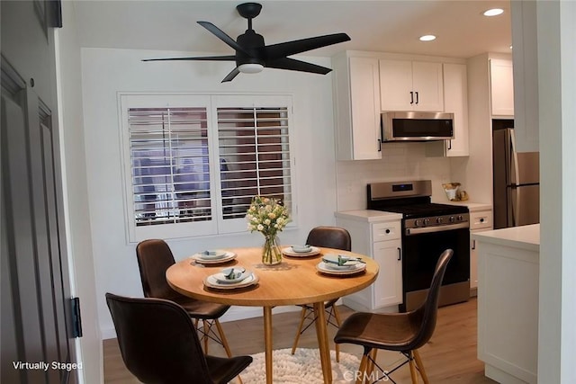 6600 Warner Ave Unit 142, Huntington Beach, CA 92647 - dining room featuring a ceiling fan, light wood-style floors, and recessed lighting
