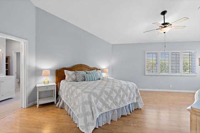 bedroom with lofted ceiling, baseboards, ceiling fan, and light wood finished floors