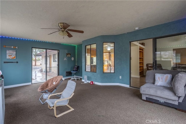 19200 Haida Rd, Apple Valley, CA 92307 - living area featuring carpet, a textured ceiling, and a ceiling fan
