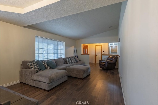 19200 Haida Rd, Apple Valley, CA 92307 - living room with lofted ceiling, baseboards, dark wood finished floors, and a textured ceiling