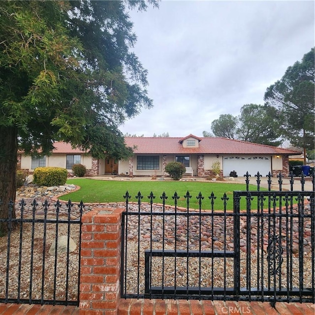 ranch-style house with a garage, a fenced front yard, a tiled roof, a front lawn, and stucco siding