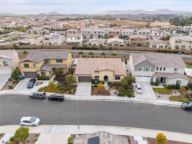 bird's eye view with a mountain view and a residential view