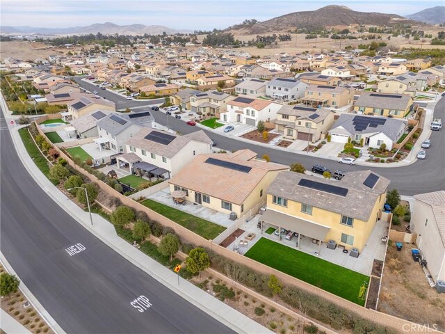 drone / aerial view featuring a mountain view and a residential view