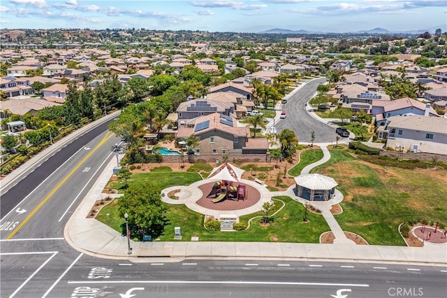 drone / aerial view featuring a mountain view and a residential view