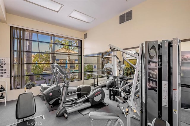 exercise room featuring visible vents