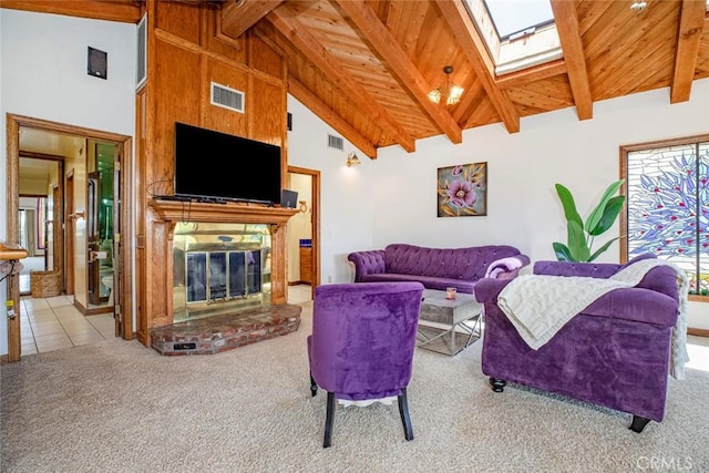 living area featuring high vaulted ceiling, wooden ceiling, carpet floors, visible vents, and beamed ceiling