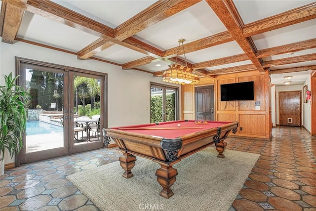 rec room with coffered ceiling, beamed ceiling, and french doors