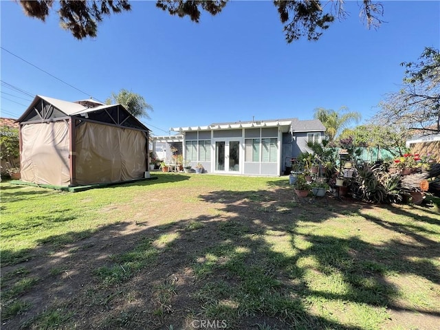 7844 Gainford St, Downey, CA 90240 - view of green lawn featuring french doors and a sunroom