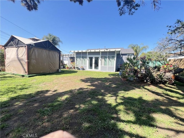 7844 Gainford St, Downey, CA 90240 - view of green lawn with a sunroom and french doors