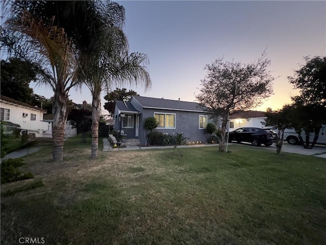 7844 Gainford St, Downey, CA 90240 - view of front of house featuring a front lawn and stucco siding