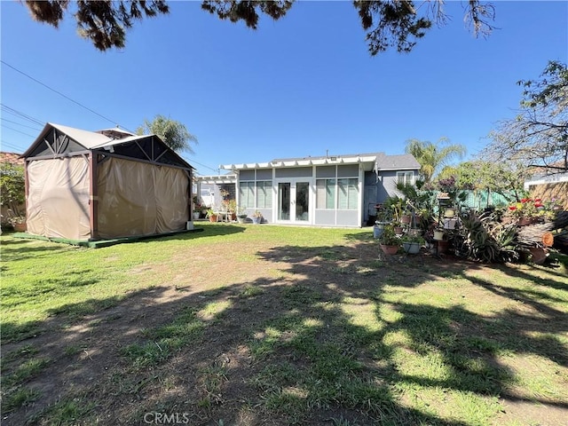 7844 Gainford St, Downey, CA 90240 - view of green lawn featuring french doors and a sunroom
