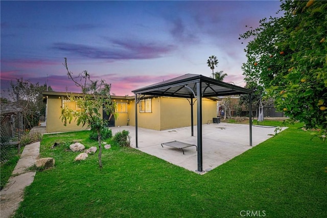 exterior space with a gazebo and a patio area