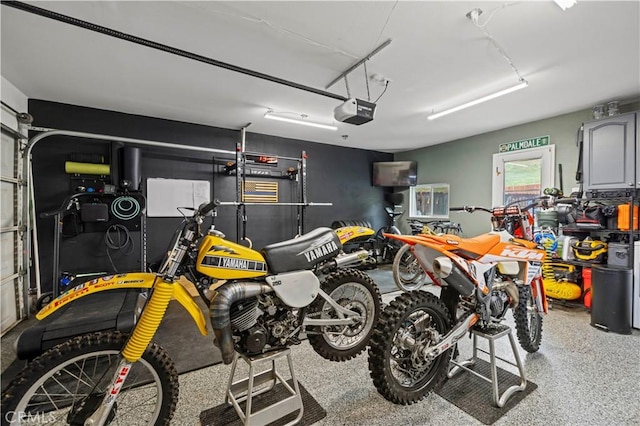 garage featuring a garage door opener