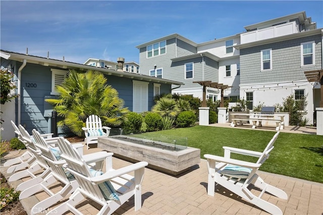 view of patio / terrace featuring a fire pit