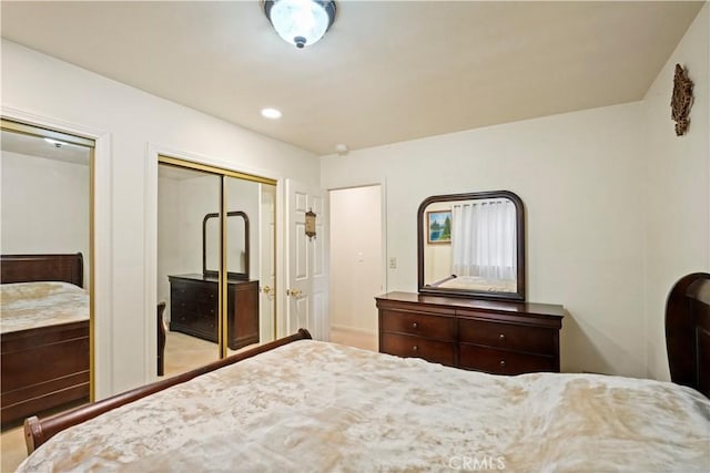 bedroom featuring recessed lighting