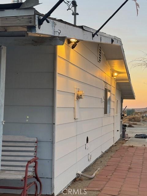 view of property exterior at dusk