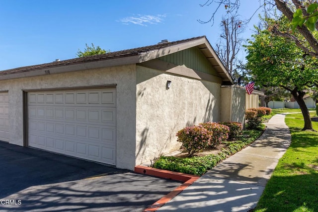 garage featuring fence