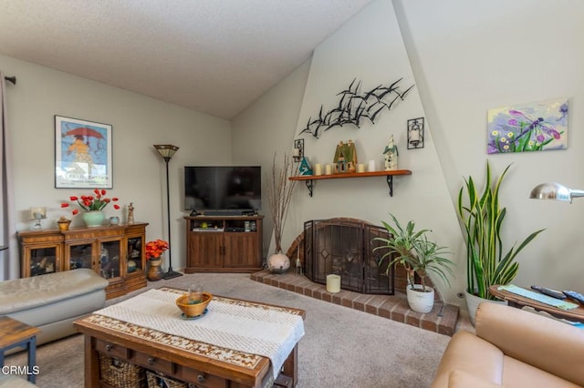 carpeted living area featuring lofted ceiling and a fireplace