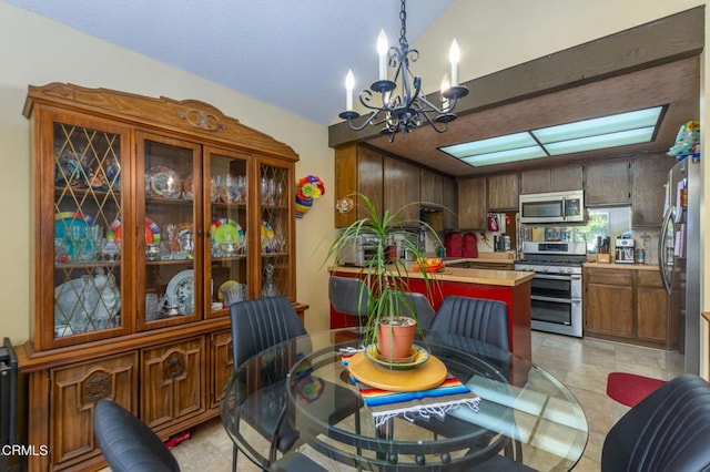 dining space featuring a chandelier