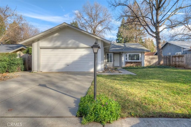 ranch-style house with a garage, brick siding, fence, driveway, and a front yard