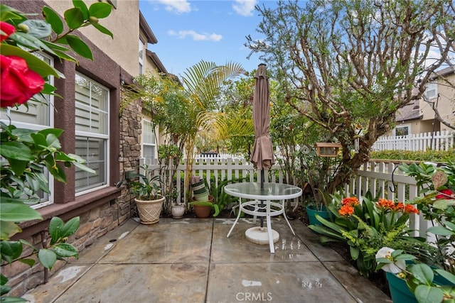 view of patio with fence